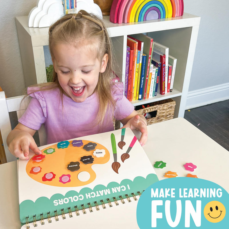 Toddler matching colors on the busy book